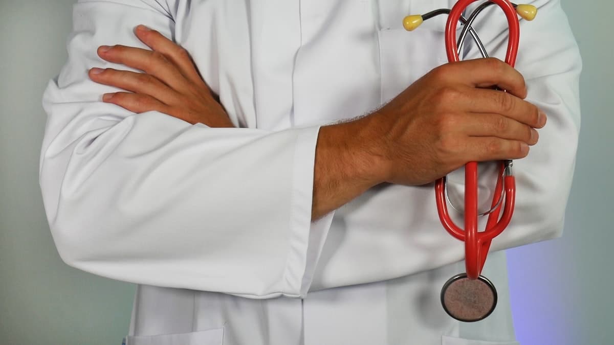 Pharmacist carrying out a health check